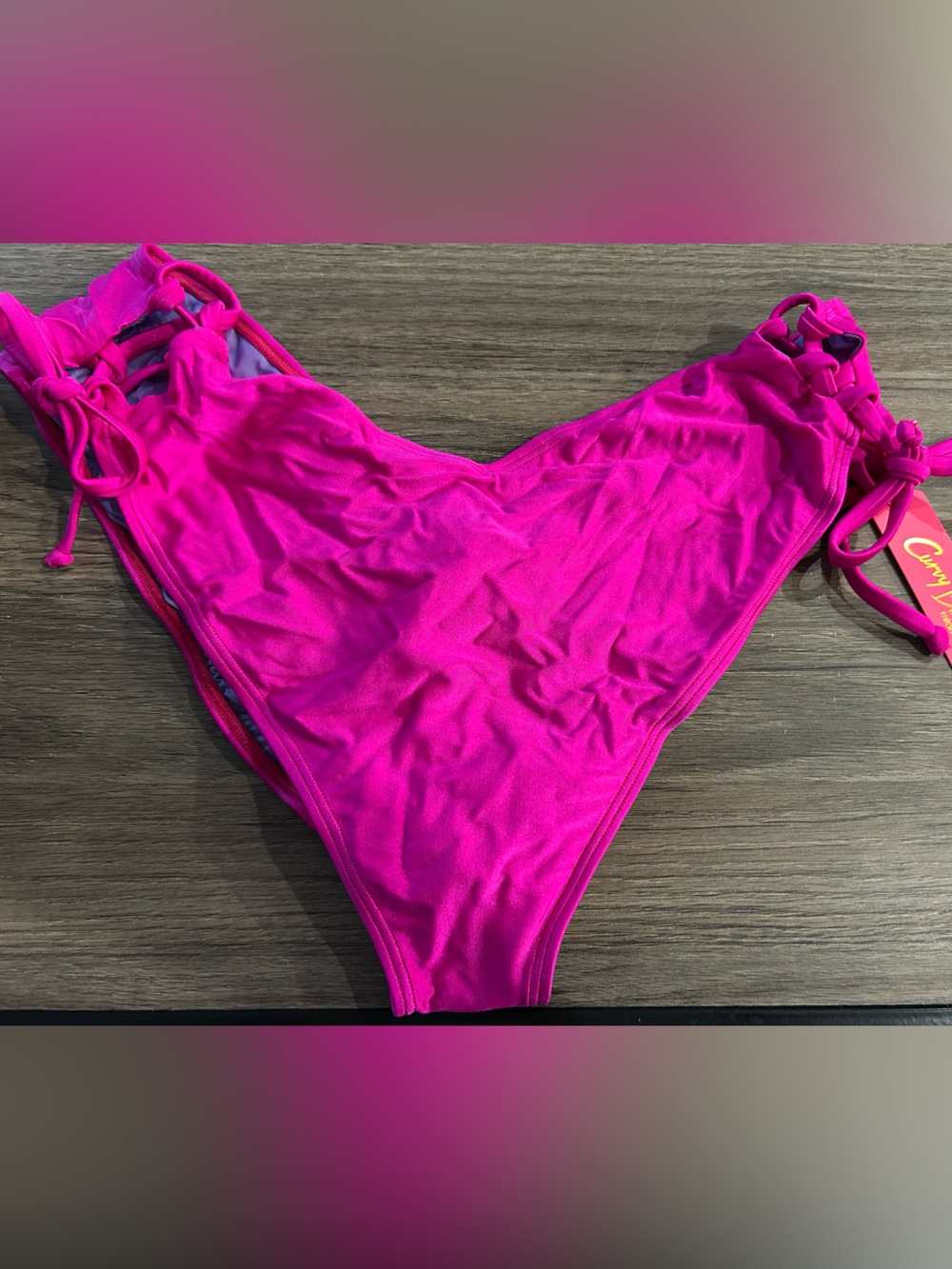 Curvy beach side tie bottom